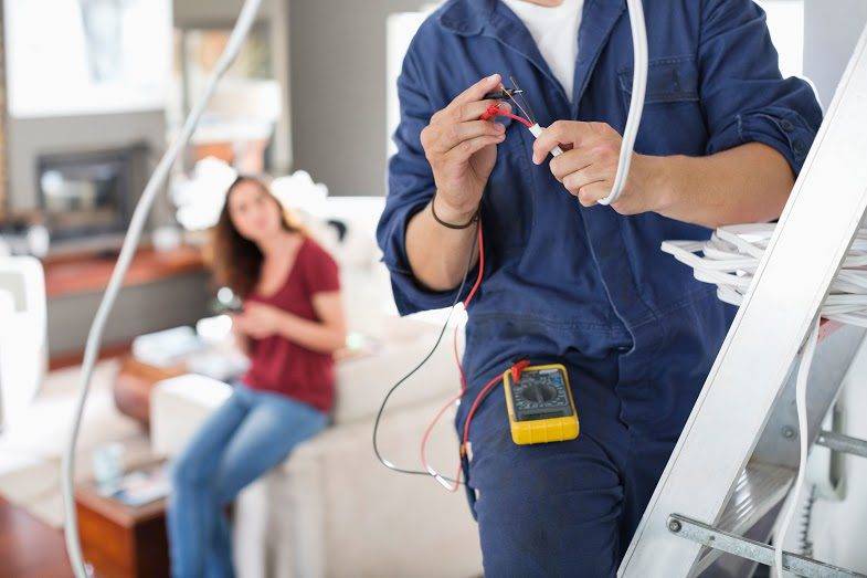 electrician-working-in-living-room